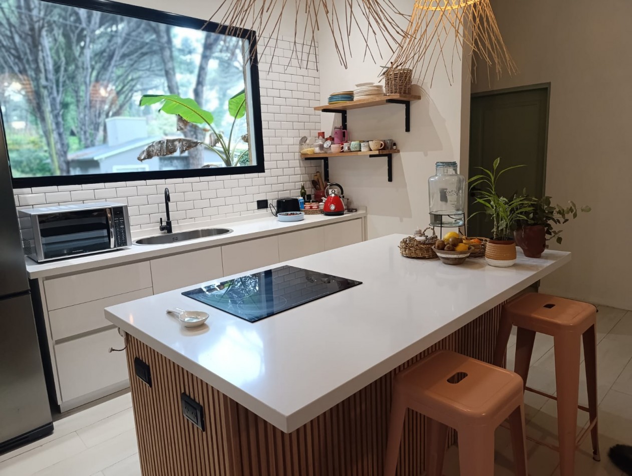 Casa en alquiler con piscina climatizada Pinamar